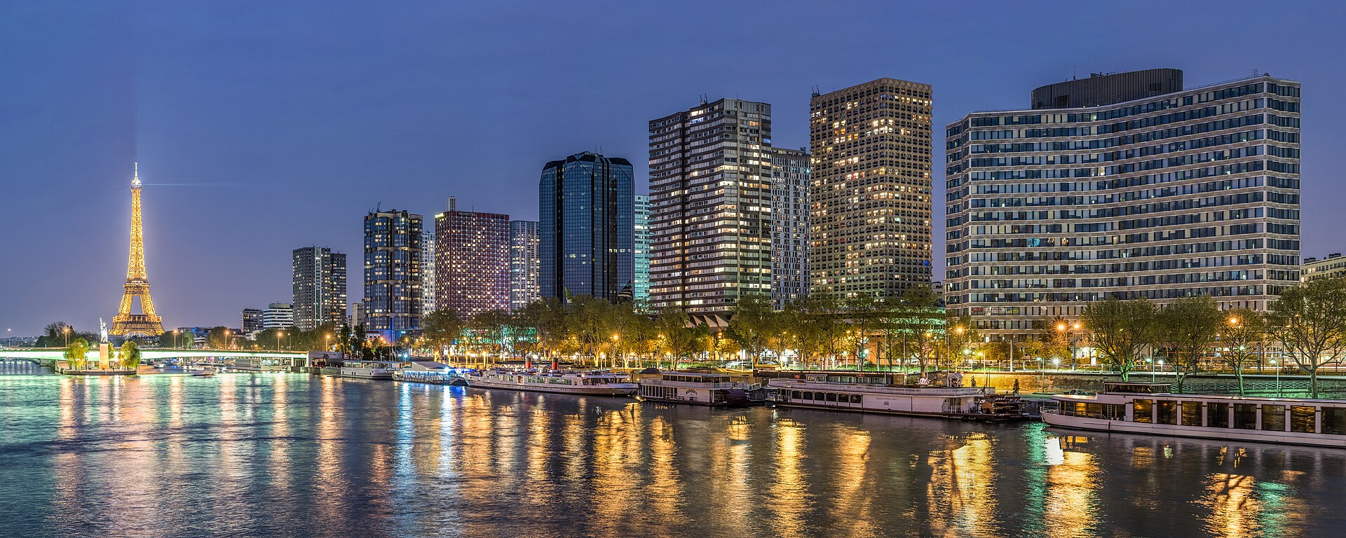 The Seine and the Paris skyline at dusk, the region where the academy and its member schools are based